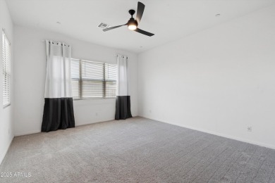 This stunning 3-bedroom, 2.5-bathroom home is nestled within a on Palm Valley Golf Club  in Arizona - for sale on GolfHomes.com, golf home, golf lot