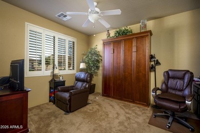 Sit on the north front patio and visit with friendly neighbors on Sunland Springs Golf Course  in Arizona - for sale on GolfHomes.com, golf home, golf lot