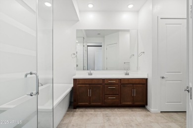 This stunning 3-bedroom, 2.5-bathroom home is nestled within a on Palm Valley Golf Club  in Arizona - for sale on GolfHomes.com, golf home, golf lot