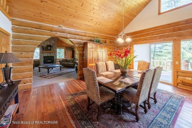 Escape to your own hand-hewn log retreat nestled in the woods of on Cedar Creek Golf Course in Wyoming - for sale on GolfHomes.com, golf home, golf lot