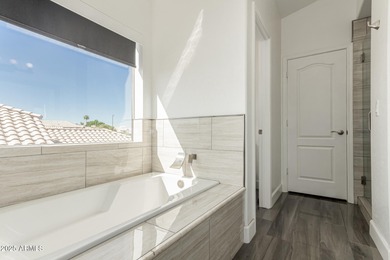 Welcome home to this gorgeous two-story residence in El Dorado on Kokopelli Golf Course in Arizona - for sale on GolfHomes.com, golf home, golf lot