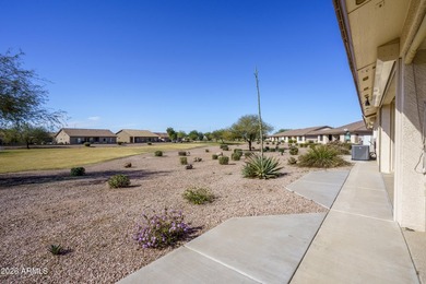 Sit on the north front patio and visit with friendly neighbors on Sunland Springs Golf Course  in Arizona - for sale on GolfHomes.com, golf home, golf lot