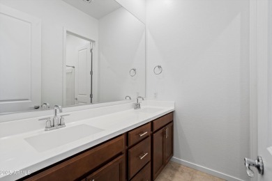 This stunning 3-bedroom, 2.5-bathroom home is nestled within a on Palm Valley Golf Club  in Arizona - for sale on GolfHomes.com, golf home, golf lot