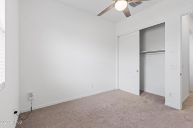 This stunning 3-bedroom, 2.5-bathroom home is nestled within a on Palm Valley Golf Club  in Arizona - for sale on GolfHomes.com, golf home, golf lot