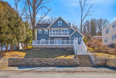 Perched high above Lake Mohawk on coveted Birch Parkway, this on Lake Mohawk Golf Club in New Jersey - for sale on GolfHomes.com, golf home, golf lot