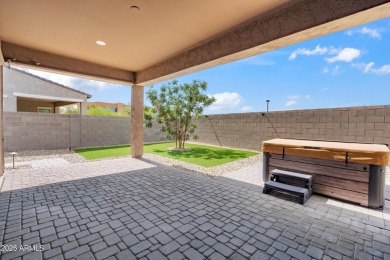 This stunning 3-bedroom, 2.5-bathroom home is nestled within a on Palm Valley Golf Club  in Arizona - for sale on GolfHomes.com, golf home, golf lot