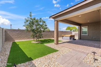This stunning 3-bedroom, 2.5-bathroom home is nestled within a on Palm Valley Golf Club  in Arizona - for sale on GolfHomes.com, golf home, golf lot