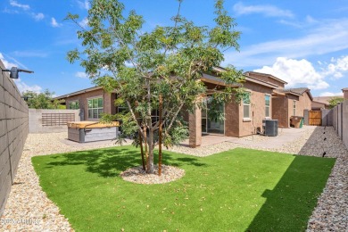 This stunning 3-bedroom, 2.5-bathroom home is nestled within a on Palm Valley Golf Club  in Arizona - for sale on GolfHomes.com, golf home, golf lot