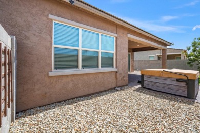 This stunning 3-bedroom, 2.5-bathroom home is nestled within a on Palm Valley Golf Club  in Arizona - for sale on GolfHomes.com, golf home, golf lot