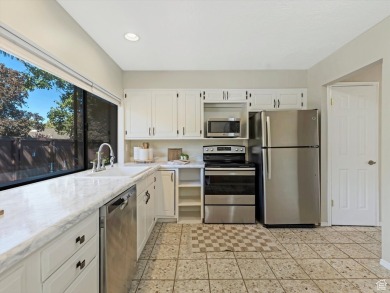 Experience serene living in this beautiful end-unit townhome on Bountiful Ridge Golf Course in Utah - for sale on GolfHomes.com, golf home, golf lot