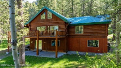 Escape to your own hand-hewn log retreat nestled in the woods of on Cedar Creek Golf Course in Wyoming - for sale on GolfHomes.com, golf home, golf lot