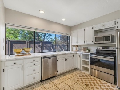 Experience serene living in this beautiful end-unit townhome on Bountiful Ridge Golf Course in Utah - for sale on GolfHomes.com, golf home, golf lot