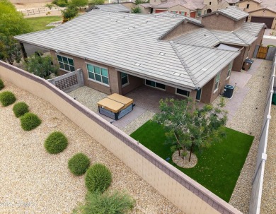 This stunning 3-bedroom, 2.5-bathroom home is nestled within a on Palm Valley Golf Club  in Arizona - for sale on GolfHomes.com, golf home, golf lot