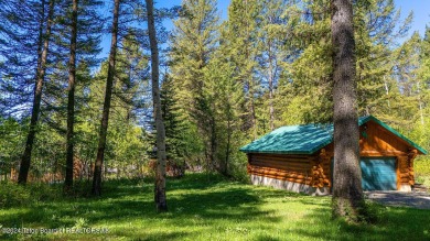 Escape to your own hand-hewn log retreat nestled in the woods of on Cedar Creek Golf Course in Wyoming - for sale on GolfHomes.com, golf home, golf lot