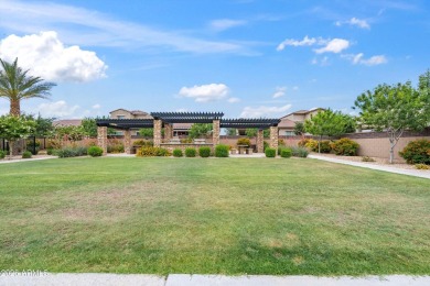 This stunning 3-bedroom, 2.5-bathroom home is nestled within a on Palm Valley Golf Club  in Arizona - for sale on GolfHomes.com, golf home, golf lot