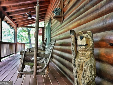 Welcome to this rare 4 bedroom, 3 1/2 bath LOG CABIN find in an on Bent Tree Golf Course in Georgia - for sale on GolfHomes.com, golf home, golf lot