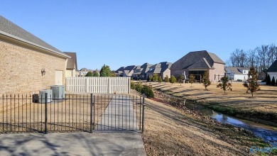 Nestled in a prestigious golf course community, this stunning on Canebrake Golf Club in Alabama - for sale on GolfHomes.com, golf home, golf lot