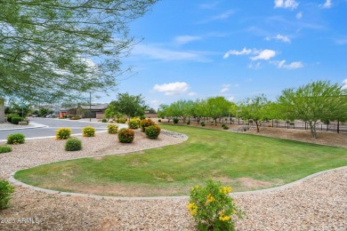 This stunning 3-bedroom, 2.5-bathroom home is nestled within a on Palm Valley Golf Club  in Arizona - for sale on GolfHomes.com, golf home, golf lot