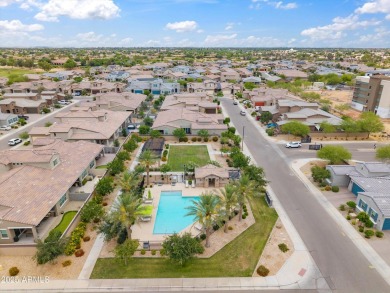 This stunning 3-bedroom, 2.5-bathroom home is nestled within a on Palm Valley Golf Club  in Arizona - for sale on GolfHomes.com, golf home, golf lot