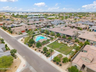 This stunning 3-bedroom, 2.5-bathroom home is nestled within a on Palm Valley Golf Club  in Arizona - for sale on GolfHomes.com, golf home, golf lot