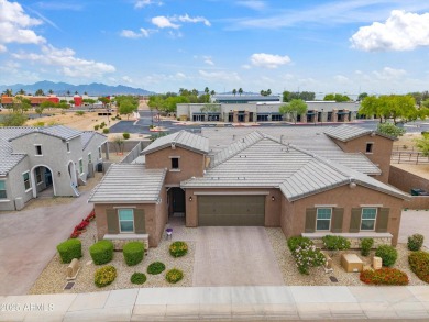 This stunning 3-bedroom, 2.5-bathroom home is nestled within a on Palm Valley Golf Club  in Arizona - for sale on GolfHomes.com, golf home, golf lot