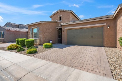This stunning 3-bedroom, 2.5-bathroom home is nestled within a on Palm Valley Golf Club  in Arizona - for sale on GolfHomes.com, golf home, golf lot