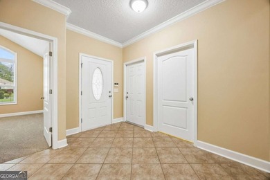 This low-maintenance 3 bedroom, 2 bathroom Single Family on Laurel Island Links in Georgia - for sale on GolfHomes.com, golf home, golf lot