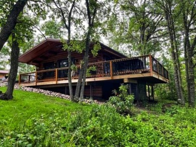 Captivating four-season Log Cabin! This beautiful on Birchwood Golf Course in North Dakota - for sale on GolfHomes.com, golf home, golf lot