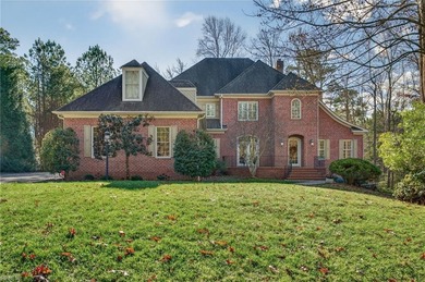 Discover timeless elegance at 173 Southport, a brick Colonial on Fords Colony Country Club in Virginia - for sale on GolfHomes.com, golf home, golf lot