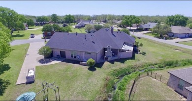 Impeccably updated and meticulously maintained spacious home on Pecan Plantation Country Club in Texas - for sale on GolfHomes.com, golf home, golf lot