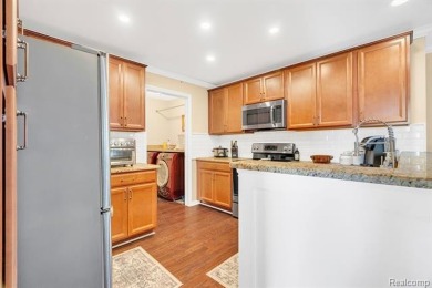 Welcome to this beautifully maintained, move-in-ready upper unit on The Glacier Club in Michigan - for sale on GolfHomes.com, golf home, golf lot