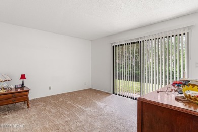 A hidden gem in the heart of Daytona Beach, this Gated community on The Club At Pelican Bay - North Course in Florida - for sale on GolfHomes.com, golf home, golf lot