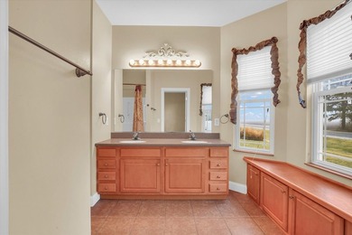 This beautiful ranch is located near Ironhorse Golf Club and on Ironhorse Golf Course in Illinois - for sale on GolfHomes.com, golf home, golf lot