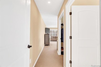 Welcome to this beautifully maintained, move-in-ready upper unit on The Glacier Club in Michigan - for sale on GolfHomes.com, golf home, golf lot
