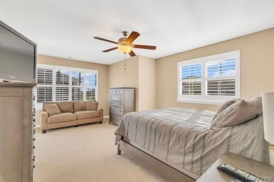 Welcome to this beautifully maintained, move-in-ready upper unit on The Glacier Club in Michigan - for sale on GolfHomes.com, golf home, golf lot