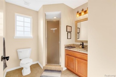 Welcome to this beautifully maintained, move-in-ready upper unit on The Glacier Club in Michigan - for sale on GolfHomes.com, golf home, golf lot
