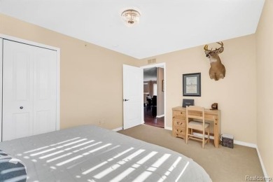 Welcome to this beautifully maintained, move-in-ready upper unit on The Glacier Club in Michigan - for sale on GolfHomes.com, golf home, golf lot