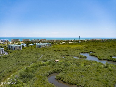 Nestled in the heart of Ponce Inlet, this luxurious condo on Harbour Village Golf and Yacht Club in Florida - for sale on GolfHomes.com, golf home, golf lot