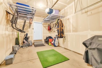 Welcome to this beautifully maintained, move-in-ready upper unit on The Glacier Club in Michigan - for sale on GolfHomes.com, golf home, golf lot