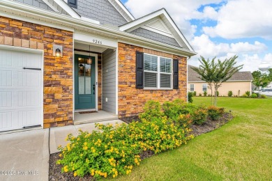 Welcome to 9246 Crossbill Dr. - a beautifully designed 4-bedroom on Cape Fear National At Brunswick Forest in North Carolina - for sale on GolfHomes.com, golf home, golf lot