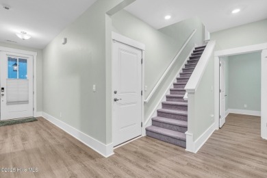 Welcome to 9246 Crossbill Dr. - a beautifully designed 4-bedroom on Cape Fear National At Brunswick Forest in North Carolina - for sale on GolfHomes.com, golf home, golf lot
