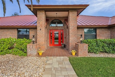 Discover luxury living in this all-brick gem within Fiddlesticks on Fiddlesticks Country Club in Florida - for sale on GolfHomes.com, golf home, golf lot