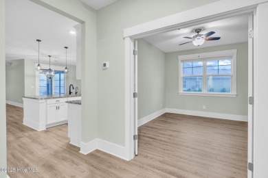 Welcome to 9246 Crossbill Dr. - a beautifully designed 4-bedroom on Cape Fear National At Brunswick Forest in North Carolina - for sale on GolfHomes.com, golf home, golf lot