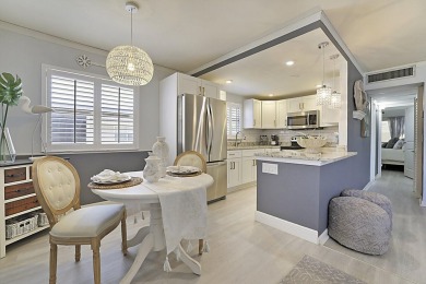 Coastal charm meets carefree living in this fully updated on Kings Point Golf - Executive in Florida - for sale on GolfHomes.com, golf home, golf lot