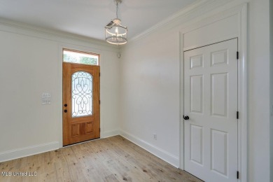 This fully renovated, spacious 5 bedroom, 4 bath home offers on Whisper Lake Country Club in Mississippi - for sale on GolfHomes.com, golf home, golf lot