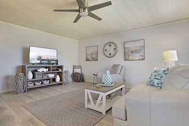 Coastal charm meets carefree living in this fully updated on Kings Point Golf - Executive in Florida - for sale on GolfHomes.com, golf home, golf lot