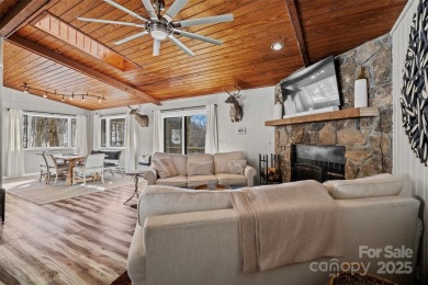 DISCOVER THE ULTIMATE MOUNTAIN RETREAT IN WOLF LAUREL! Living in on Wolf Laurel Country Club in North Carolina - for sale on GolfHomes.com, golf home, golf lot