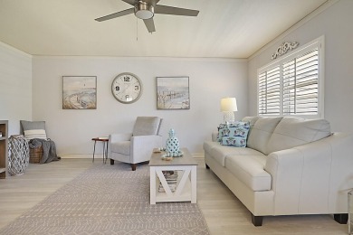 Coastal charm meets carefree living in this fully updated on Kings Point Golf - Executive in Florida - for sale on GolfHomes.com, golf home, golf lot