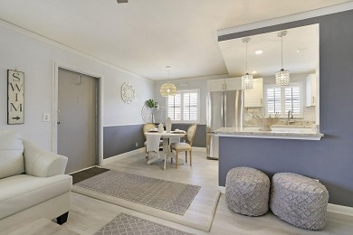 Coastal charm meets carefree living in this fully updated on Kings Point Golf - Executive in Florida - for sale on GolfHomes.com, golf home, golf lot