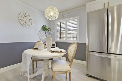 Coastal charm meets carefree living in this fully updated on Kings Point Golf - Executive in Florida - for sale on GolfHomes.com, golf home, golf lot